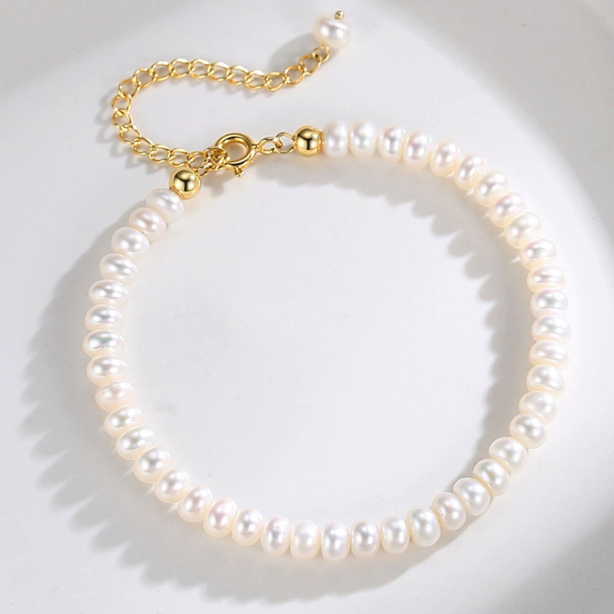 BAROQUE PEARL BRACELETGIFTLISTEBAROQUE PEARL BRACELETsterling silver, pearl, 18k gold vermeil, bracelet