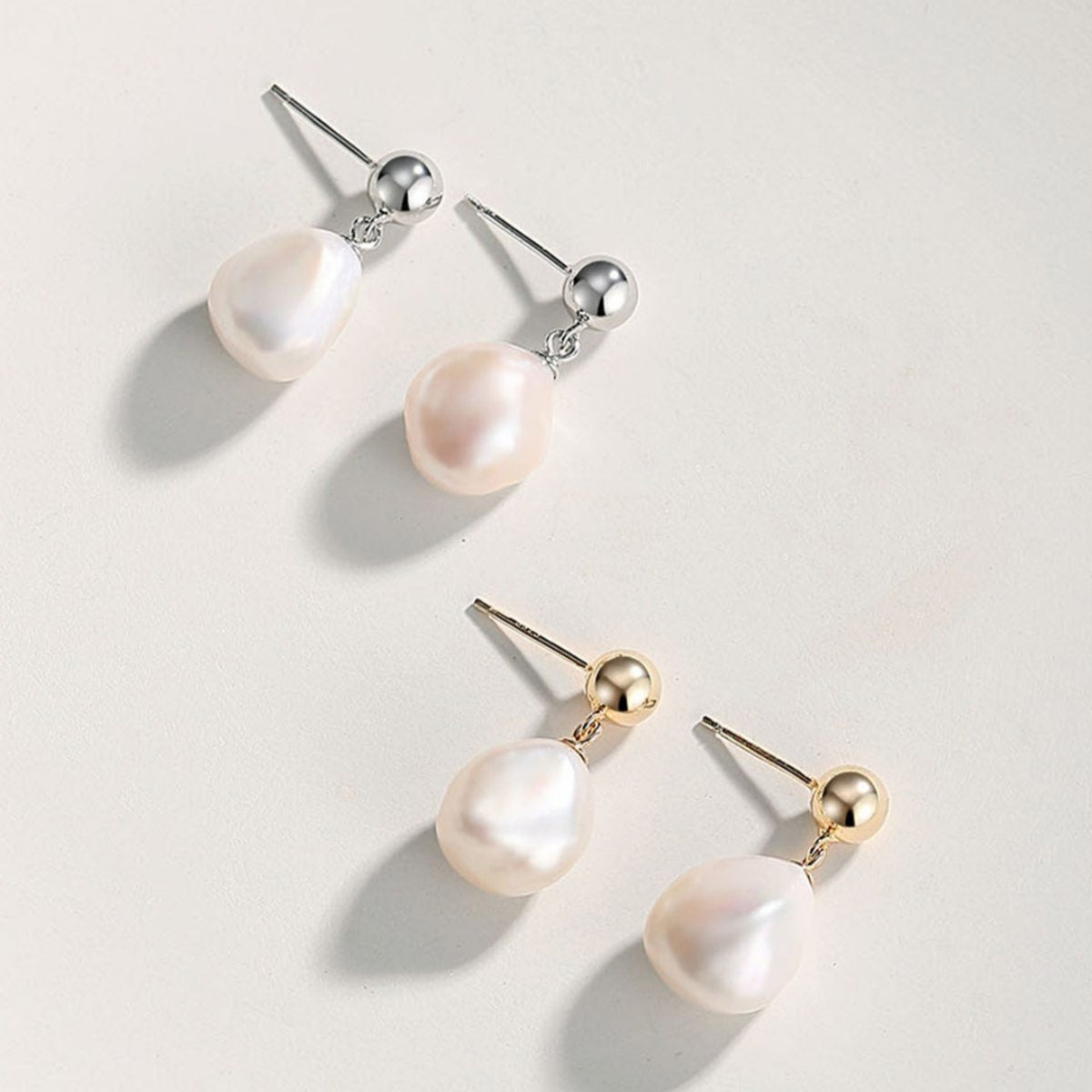 BAROQUE PEARL EARRINGSGIFTLISTEBAROQUE PEARL EARRINGSsterling silver, pearl, 18k gold vermeil, earrings