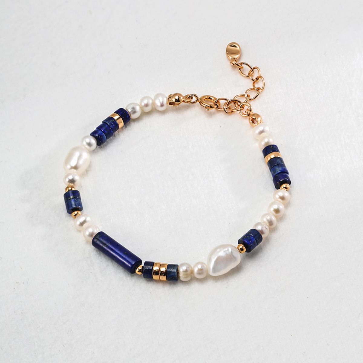 BAROQUE PEARL LAPIS LAZULI BRACELETGIFTLISTEBAROQUE PEARL LAPIS LAZULI BRACELETsterling silver, lapis lazuli, pearl, 18k gold vermeil, bracelet