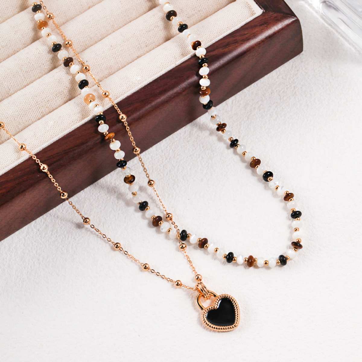 TIGER EYE AGATE NECKLACEGIFTLISTETIGER EYE AGATE NECKLACEnecklace, 18k gold vermeil, sterling silver, treated freshwater cultured pearl, tiger eye, black agate, silver silk shell